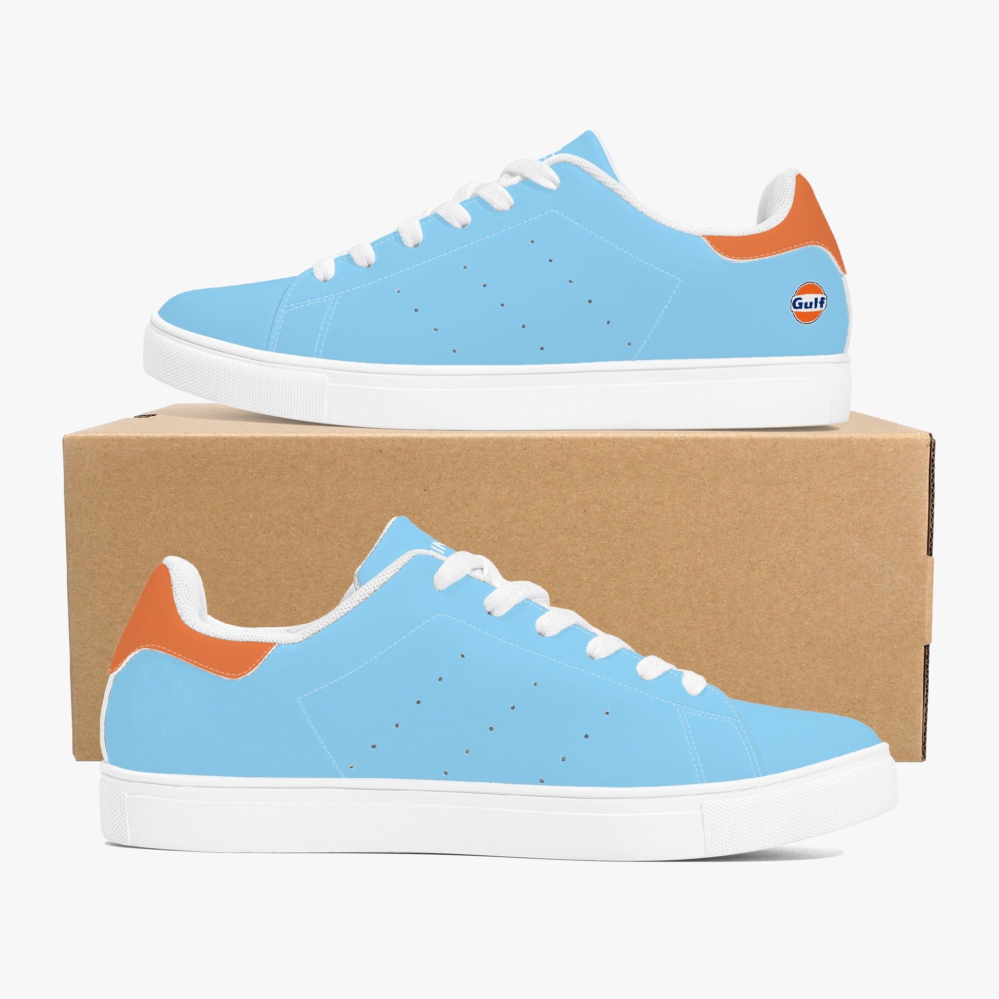 Gulf Racing leather sneakers inspired by classic motorsports heritage. Designed for unisex wear with a sleek, custom look.